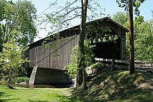 The historic Cedarburg covered bridge in Ozaukee County's Covered Bridge Park Covered Bridge Cedarburg WI May-09.jpg