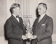 Eddie August Schneider on September 27, 1930 accepting the Great Lakes Trophy in Detroit, Michigan from David Vincent Stratton of the Great Lakes Aircraft Corporation