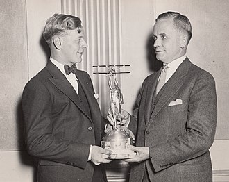 Eddie August Schneider on September 27, 1930 accepting the Great Lakes Trophy in Detroit, Michigan from David Vincent Stratton of the Great Lakes Aircraft Corporation Eddie August Schneider on September 27, 1930 accepting the Great Lakes Trophy in Detroit, Michigan (600 dpi, 100 quality, cropped).jpg