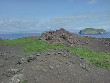 Volcanism in the south of Iceland:Bjarnarey, Eldfellshraun and Eyjafjallajökull in the background