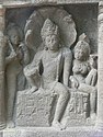 Nagaraja in ardhaparyanka asana, with his wife holding lotus and wearing mangalasutra[211]