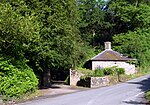 small lodge on road at entrance to Alltyrodyn