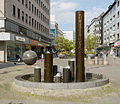 * Nomination Public artwork Ohne Titel (Untitled) by Ernst Rasche in Mülheim. The artwork consists of 3 granite parts: The fountain, the relief-like ball (left) and columns useable as seets in different sizes[2] --Tuxyso 22:08, 24 May 2015 (UTC) * Promotion Good quality --DKrieger 22:46, 24 May 2015 (UTC)