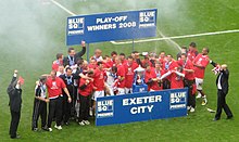 The Exeter team celebrates after the 2008 Conference National playoff final win. Exeter-Blue-Square-Premier-08-Celebrate-crop.jpg