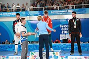 Deutsch: Fechten bei den Olympischen Jugend-Sommerspielen 2018: Tag 1, 7. Oktober 2018, Jungen, Säbel, Siegerehrung - Gold: Krisztián Rabb (HUN), Silber: Hyun Jun (KOR), Bronze: Mazen Elaraby (EGY); Medaillen überreicht durch IOC-Mitglied Britta Heidemann, Maskottchen überreicht durch FIE-Generalsekretär Emmanuel Katsiadakis English: Fencing at the 2018 Summer Youth Olympics at 7 October 2018 – Boys' sabre Medal ceremony – Gold: Krisztián Rabb (HUN), Silver: Hyun Jun (KOR), Bronze: Mazen Elaraby (EGY); Medal presenter: IOC member Britta Heidemann, Mascot presenter: FIE Secretary General Emmanuel Katsiadakis