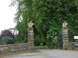 Entrance to Foulis Castle, note the golden eagles on each pillar, symbols of the Clan Munro Foulis Castle gateway - geograph.org.uk - 207613.jpg