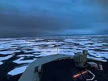 HMCS Harry DeWolf, shown transiting through icy waters in the Northwest Passage, has a Polar Class 5 rating. HMCS Harry DeWolf Arctic Transit Aug 2021.jpg