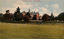Hand coloured postcard of the main school building Hand coloured postcard of the Grammar School at Toowoomba (4312620191).jpg