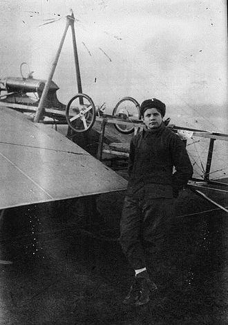 Marcel Hanriot in front of the 1909 monoplane Hanriot 1909.jpg