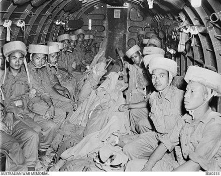 Indian paratroops waiting to jump over Rangoon, Burma, 1945.