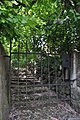 Deutsch: Alter Treppenweg mit Pforte zum Kirchhof von Leezen (Holstein). This is a photograph of an architectural monument. It is on the list of cultural monuments of Leezen (Holstein), no. 2.4.