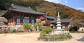 Geungnakjeon (Hall) is in the style of the last years of the Joseon period (1392-1910). The temple, however, dates from the Three Kingdoms period (57B.C.-A.D.668) when it was built as a branch of Songgwangsa Temple. It is said to have been burnt down during the 1597 Japanese Invasion and to have been reconstructed in 1604. Geungnakjeon has a hipped-and-gabled roof with eaves of the roof supported by clusters of brackets. This multi-bracketing is typical of late-Joseon architecture. Records show that the building was either repaired or rebuilt in 1846, the 12th year of the reign of Joseon's King Heonjong(1849-63). Geumtapsa is at the base of Mount Cheondeungsan in Goheung county originally dates to the 7th century. One of the more prominent featuers is Natural Monument no. 239, the nutmeg forest that surrounds the temple.