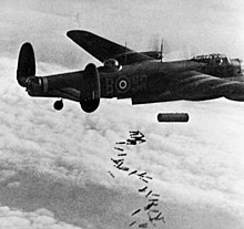 Lancaster releases a 4,000 lb (1,800 kg) HC "cookie" and 108 30 lb (14 kg) "J" incendiaries. (over Duisburg 1944) Lancaster I NG128 Dropping Blockbuster - Duisburg - Oct 14, 1944.jpg