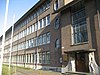 Laboratorium met dienstwoning Gortergebouw in wederopbouwarchitectuur, thans kantoorgebouw