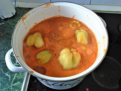 Croatian stuffed peppers in a cooking pot