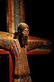 Majestat Batlló, el tipus de representació de la crucifixió pròpia del romànic: el Crist en Majestat victoriós sobre la mort, vestit, hieràtic, sever i sense manifestar patiment