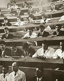 The first university in Iran without sex segregated classes in 1960s. Male and female medical students at Tehran University listen intently during a lecture in the 1960s.jpg