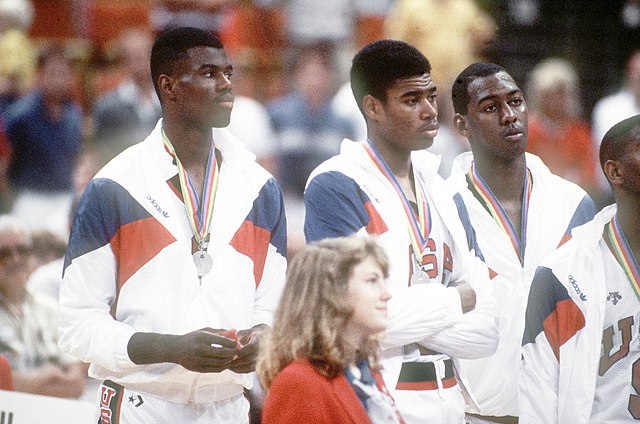 David Robinson, left, stands with some of his teammates at Market Square Arena after they were awarded silver medals for their performance in the 1987