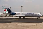 Montenegro Airlines Fokker F100 (4O-AOM) taxiing for departure to Podgorica (TGD - LYPG) @ Frankfurt - Rhein-Main International (FRA - EDDF).jpg