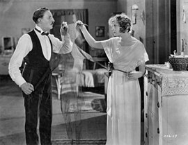 Cyril Chadwick and Esther Ralston as Mr. and Mrs. Darling