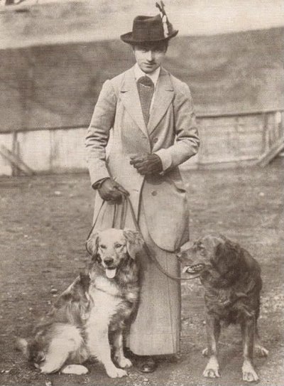 Winifred Charlesworth with two of her Golden Retrievers, 1910s