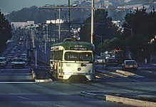 A southbound streetcar leaves the station in 1980. Muni 1109 at 19th Avenue and Font, December 1980.jpg