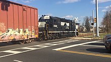 Conrail Shared Assets Operations' Hainesport Industrial Track is a prime example of a freight branch line. This line sees one short freight train a day primarily to serve a paper mill, industrial park, and lumber yard in Mount Laurel, Hainesport, and Mount Holly, New Jersey, respectively. The nearest main line railroad is roughly six miles (9.7 km) from where this photograph was taken. NS Mt Holly Branch Line at Mt Laurel.jpg