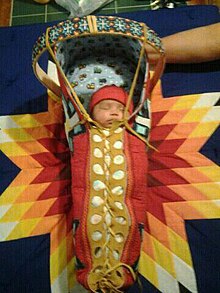 Native American baby in cradle board with baby star quilt Native Baby and Star Quilt.jpg