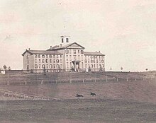 Hertzog Hall (1856) was built when both the seminary and Rutgers College became too large to be accommodated in Old Queens. New Brunswick Theological Seminary New Jersey Hertzog Hall 1862.jpg