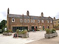 Early 19th-century north range of almshouses in Burgess Park. [496]