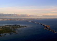 Øresund Bridge from Denmark to Sweden. On the right the artificial Peberholm and on the left Saltholm. This picture is taken from the air.