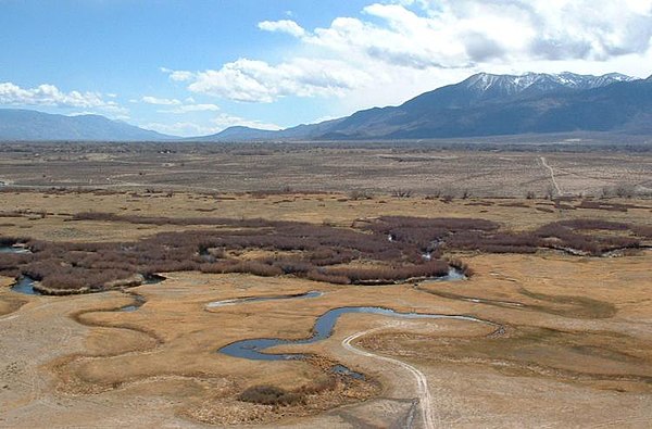 The semi-arid Owens Valley, with the Owens River flowing through the foreground