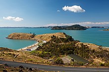 Looking towards Pakihi Island (in the centre of the photo) from Waitawa Regional Park.  (Ponui Island is in the background, and part of Karamuramu Island is visible to the far right.)