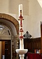 Paschal candle inside the Church of Saint Mary Magdalene in East Ham. [126]