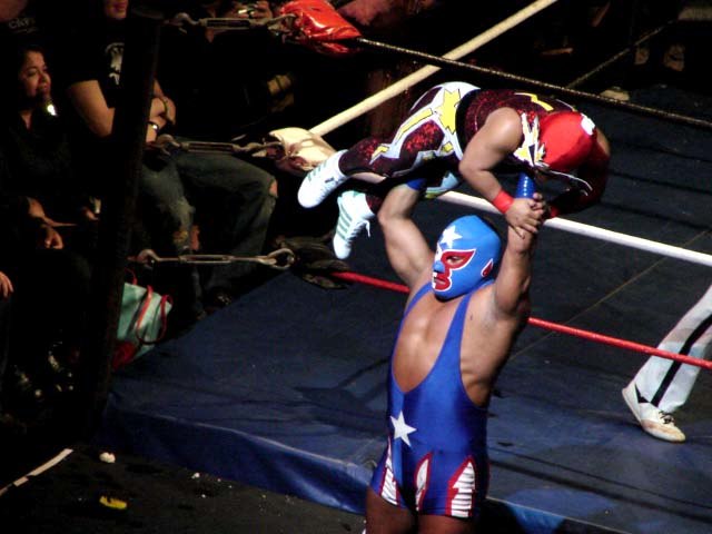 Pierrothito lifting Tzuki during a match in the United States