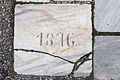 English: Marble floor plate with the engraved year 1876 Deutsch: Marmor-Bodenplatte mit der Jahreszahl 1876