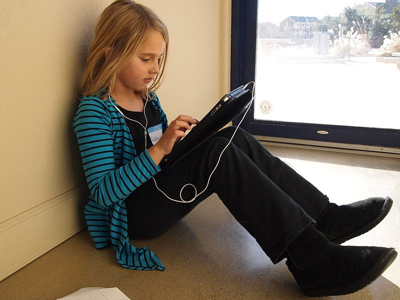 File:School girl with an iPad (6659992675).jpg