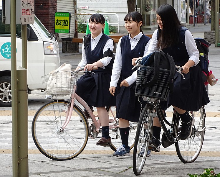 File:Schoolgirls on Bikes - Heiwa Street - Asahikawa - Hokkaido - Japan (48018098113).jpg