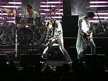 Schroeder (right) performing with the Smashing Pumpkins in 2007 Smashing Pumpkins@Le Grand Rex, 2007.jpg