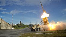 A Lockheed Martin Terminal High Altitude Area Defense (THAAD) system used for ballistic missile protection The first of two Terminal High Altitude Area Defense (THAAD) interceptors is launched during a successful intercept test - US Army.jpg