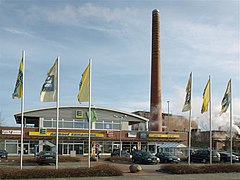 Einkaufszentrum - (Im Hintergrund: Papierfabrik Meldorf) - 53°41′45″N 9°42′53″E﻿ / ﻿Esinger Straße 3 - 7﻿ / 53.695820; 9.714708 - Baujahr: 2001