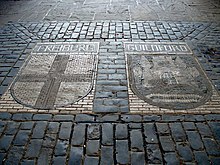 Guildford and Freiburg im Breisgau coats of arms mosaic installed on the floor of the building Twin Town Coats-of-Arms - geograph.org.uk - 330436.jpg