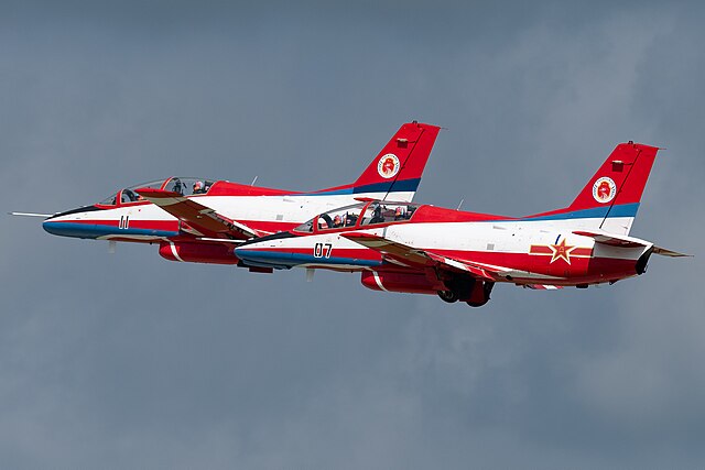 https://upload.wikimedia.org/wikipedia/commons/thumb/4/45/Two_Red_Falcon_JL-8s_taking_off_at_CCAS2023_%2820230724092045%29.jpg/640px-Two_Red_Falcon_JL-8s_taking_off_at_CCAS2023_%2820230724092045%29.jpg