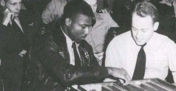 Brown in the ready room of the aircraft carrier USS Leyte.