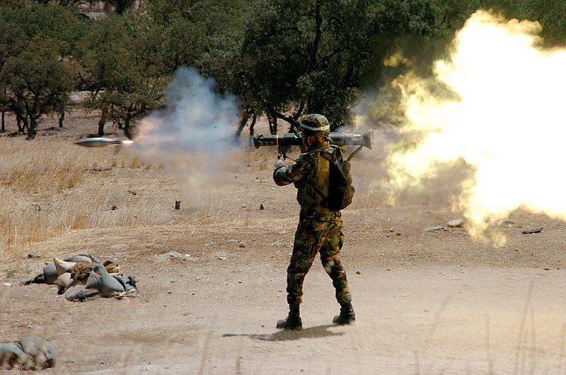 File:US Navy 040729-N-9712C-001 Builder 2nd Class Patrick King, a range coach from the Thirty-First Seabee Readiness Group, gives a demonstration on the M136 AT-4 rocket launcher.jpg