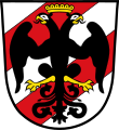 Gemeinde Holzheim In Silber zwei rote Schräglinksbalken, belegt mit einem golden bewehrten und gekrönten schwarzen Doppeladler.