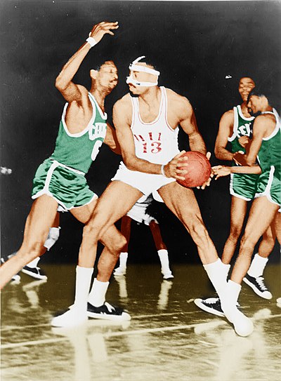 Wilt Chamberlain of the Philadelphia 76ers being defended by Celtics' center Bill Russell in 1966