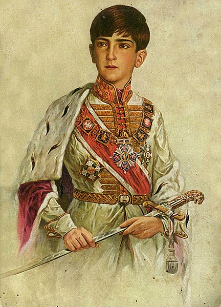 A portrait of the young King Peter II holding his father's sabre.