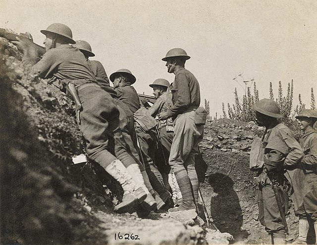 Doughboys of Company B, 328th Infantry Regiment, 82nd Division, serving in a front line trench, France, 1 July 1918