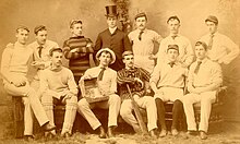 Penn's 1887 Cricket Team, which won the Intercollegiate Cricket Association, the de facto national championship, displaying the trophy granted to winner (held in front row by person wearing white hat) 1887 Penn Cricket Team 2.jpg